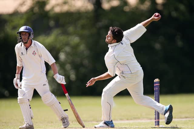 Nathan White bowling for Waterlooville 2nds against Railway Triangle. Picture: Chris Moorhouse