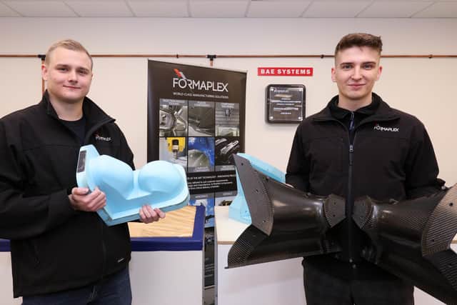 Apprentices Casey Keates, left, and Ed Jupp with moulds they used for the sit ski parts. 
Picture: Chris Moorhouse   (jpns 241121-14)