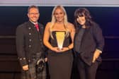 Carrington West's Emily Christmas picks up the HR Person of the Year award at the Investors in People awards in London. Picture: Carrington West