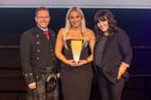 Carrington West's Emily Christmas picks up the HR Person of the Year award at the Investors in People awards in London. Picture: Carrington West