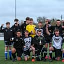 Captain Daniel Andrews (holding cup) celebrates with his Fleur de Lys Victory team after the Under-16 GEC Marconi Invitation Cup final win against Cowplain Youth. Picture: Chris Moorhouse