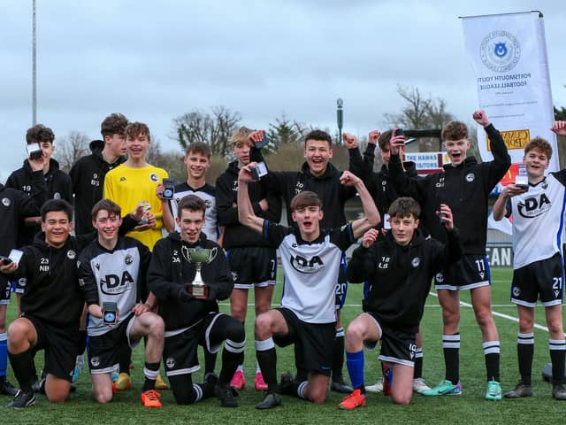 Captain Daniel Andrews (holding cup) celebrates with his Fleur de Lys Victory team after the Under-16 GEC Marconi Invitation Cup final win against Cowplain Youth. Picture: Chris Moorhouse