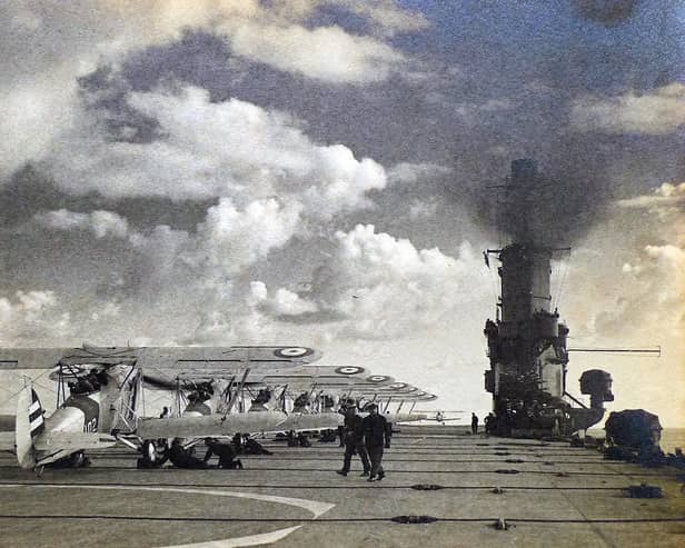 Swordfish aircraft are lined up on Ark Royals flight deck during her spring cruise in 1939. Note the arrestor cables which pilots had to use great skill to hook on to come to a halt when landing.Picture: Courtesy of Tim King