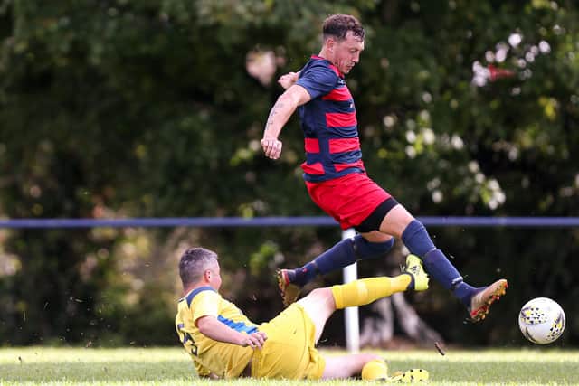 Danny Lane evades a tackle during Paulsgrove's win against Liphook. Picture: Chris Moorhouse
