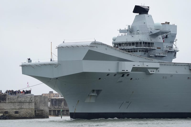 HMS Prince of Wales sailing past the Hot Walls and the Round Tower. Picture: Andrew Matthews/PA Wire