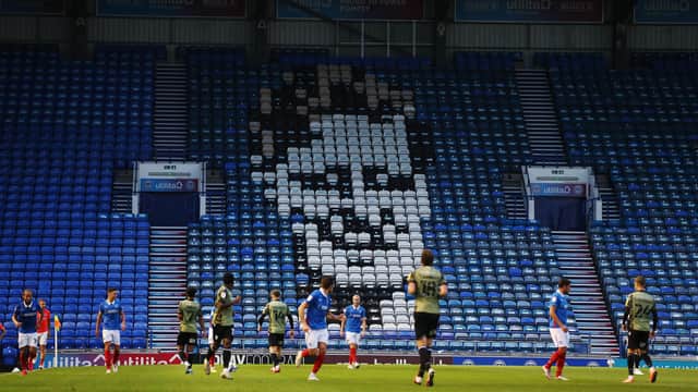 Jimmy Dickinson's face is immortalised on the seats in Pompey's Fratton end
