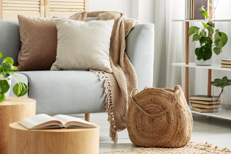 Buyers want to visualise themselves living in a property. Accessories such as blankets, throws, and scatter cushions help give a room a homely finishing touch.