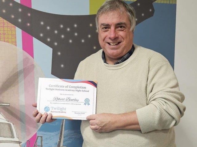 Robert Bentley, International Author and Bid Writer receiving his completion certificate.