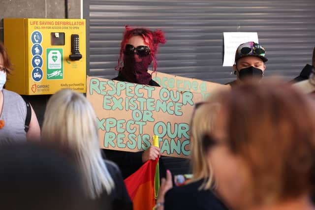 A Drag Queen hosting a children's story time at Southsea Library. Pictured are protests for and against it outside.

Picture: Sam Stephenson.