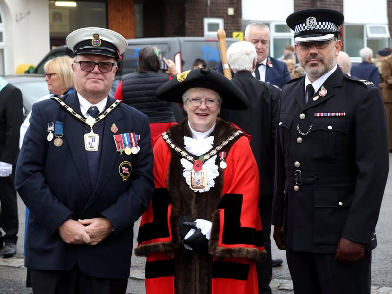 Havant Remembrance Sunday Service.Pictured is (L-R) Graham Raines, Cllr Rosie Raines and Special Sup Int Russell Morrison at the event.The parade is taking place at St Faiths War Memorial with Deputy Lieutenant Major General James Balfour CBE DL in attendance, along with the Mayor of Havant, Alan Mak MP and the Leader of Havant Borough Council, Councillor Alex Rennie.At 10.35 am the Parade leaves Royal British Legion Ex-servicemen's club, Brockhampton Lane, into Park Road South along Elm Lane before turning into North Street. Bagpiper Denton Smith will be accompanied by drums courtesy of Hampshire Caledonian Pipe Band. Then at 10.50 am the parade assembles at War memorial outside St Faiths Church ahead of an Act of Remembrance at the War Memorial outside St Faiths Church at 10.52am, followed by a two-minute's silence at 11am. A Remembrance Service will then take place inside St Faiths Church.Sunday 12th November 2023.Picture: Sam Stephenson.