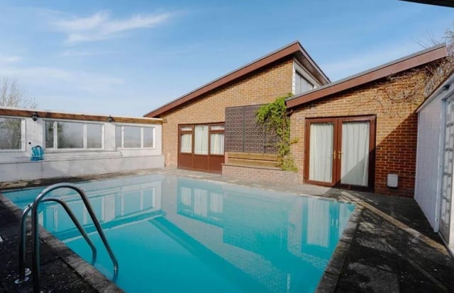 The house comes with a sunken swimming pool.