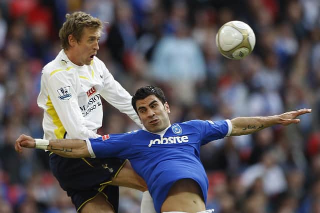 Ricardo Rocha challenges Peter Crouch at Wembley. Pic: Nick Potts/PA Wire.