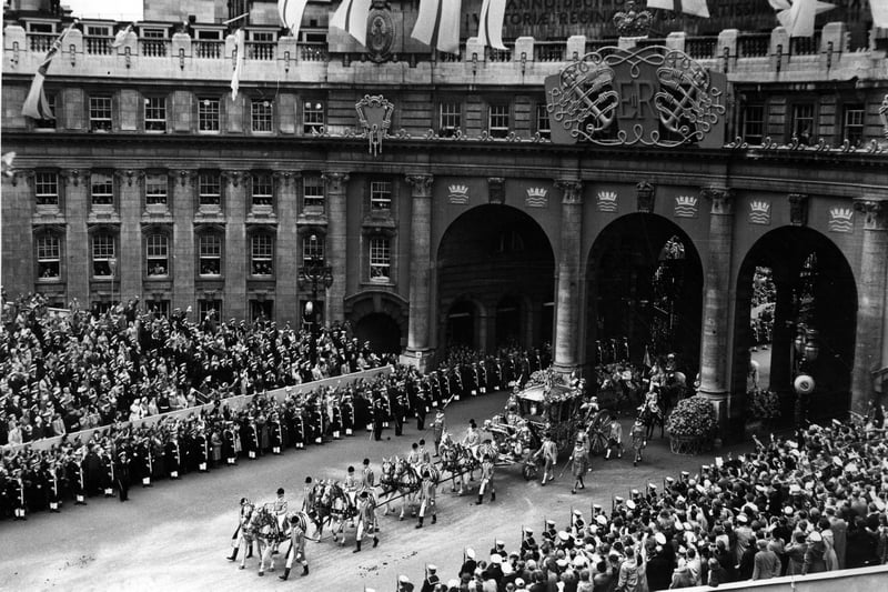 Queen Elizabeth II's Coronation carriage and procession coming through Admiralty Arch on the way from Westminster Abbey to Buckingham Palace Picture: Hulton Archive/Getty Images