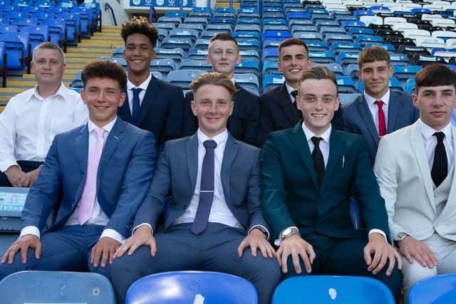 Ethan Robb (second left, front row) spent two years as a scholar at Fratton Park. His intake included Haji Mnoga (Back second left), Alfie Stanley and Harry Kavanagh (both back middle). Picture: Simon Hill/ Portsmouth FC