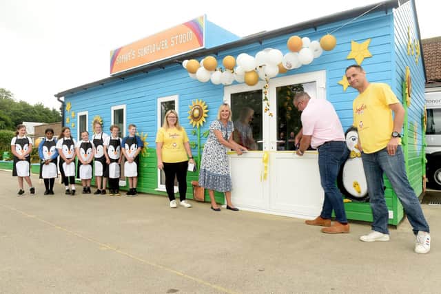 The grand opening of Sophie's Sunflower Art Studio took place on Friday, June 24, which has been built as a charity build at Crofton Anne Dale Federation in Stubbington. This is part of Sophie's Legacy, the charity set up for Sophie Fairall. 

Pictured is: (l-r) Sophie's mum Charlotte Fairall and dad (right) Gareth with Caroline Dinenage MP and Clive Saughter.

Picture: Sarah Standing (240622-897)
