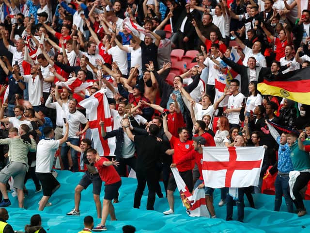 Fans in the crowd at Wembley Stadium on June 29, 2021 in London, England. Photo by Matthew Childs - Pool/Getty Images