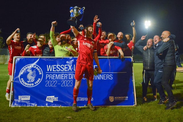 Horndean celebrate with the trophy. Picture by Martyn White