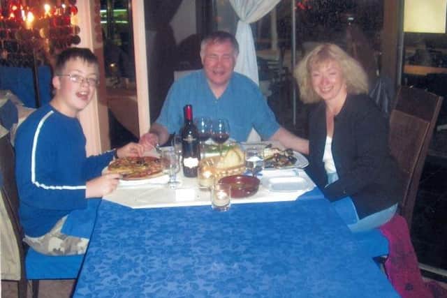 Iain Shepherd, centre, pictured with his former wife Mary and stepson Joshua Powell
