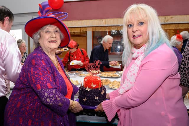 Irene with Daryl Miller who made the cake.

Picture: Keith Woodland (160421-26)