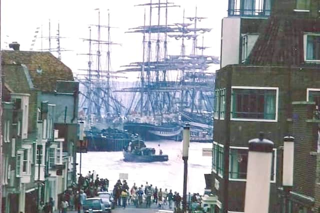 With Broad Street nearest the camera, the Outer Camber with sailing ships and Portsdown Hill in the distance this vista is almost 3D.