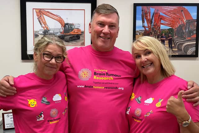 Graham's three children Sharon, Andrew and Michelle who were part of a team of 13 friends and family tackling the Great South Run in memory of Graham Green.