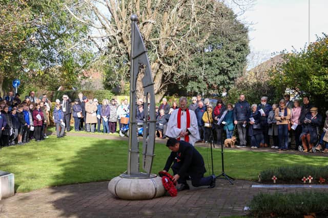 Alan Mak MP lays a wreath in Emsworth Memorial Garden on Armistice Day