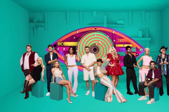 Tate Reynolds, centre, with this year's Big Brother housemates. Pic: ITV