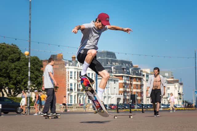 Southsea skater Tyler Fitall (21) testing some tricks on the seafront. Picture: Mike Cooter (200721)