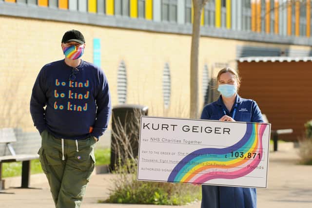 Neil Clifford, chief executive of Kurt Geiger, presented a cheque for £103,871 to his niece Kerry Morrison, an anticoagulant nurse specialist at Queen Alexandra Hospital in Cosham, after she inspired the brand's charity campaign.
Picture: Sarah Standing (300321-2974)