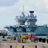 Britain's biggest warship HMS Queen Elizabeth pictured returning to Portsmouth after 10 weeks at sea, carrying out critical training.

Picture: Sarah Standing (020720-5149)