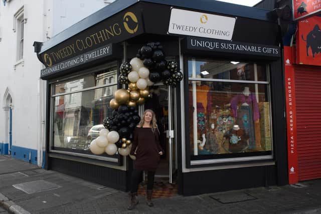 Pictured is: Cacey outside the shop. Picture: Keith Woodland (260221-3)