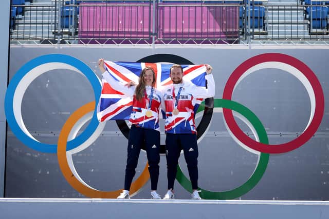 Gold medalist Charlotte Worthington and Bronze medalist Declan Brooks of Team Great Britain pose for a photo together after the BMX Freestyle on day nine of the Tokyo 2020 Olympic Games at Ariake Urban Sports Park. Photo by Ezra Shaw/Getty Images.