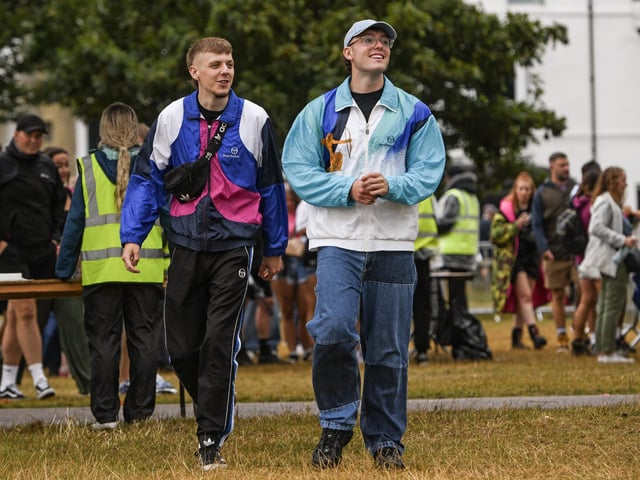 People brave the wet weather at Victorious Festival on Southsea Common in Portsmouth today during the three day event the bank holiday weekendPicture Credit: Solent News Agency