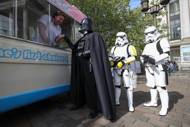 Copsplay actors dressed as Darth Vader and stormtroopers buy an ice cream van during a previous Portsmouth Comic Con at Portsmouth Guildhall. Picture by Andrew Matthews/PA Wire