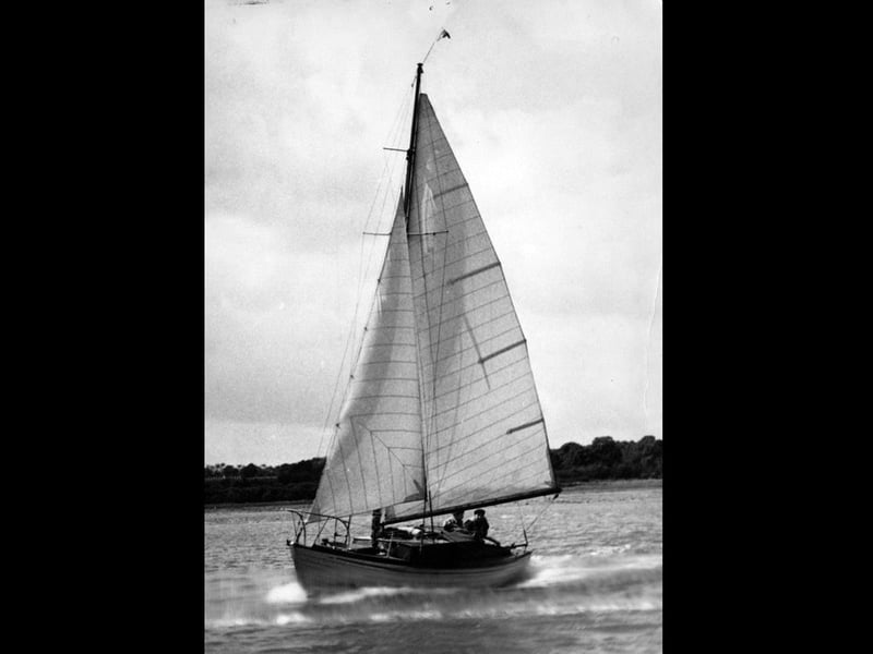 Boat under sail on Fareham Creek.