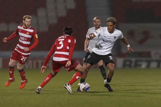 Haji Mnoga was initially handed a right wing-back role in the first half of Pompey's trip to Doncaster. Picture: Daniel Chesterton/phcimages.com