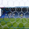 Mosaics depicting Jimmy Dickinson and the Pompey crest have overlooked the Fratton Park pitch since 1997.