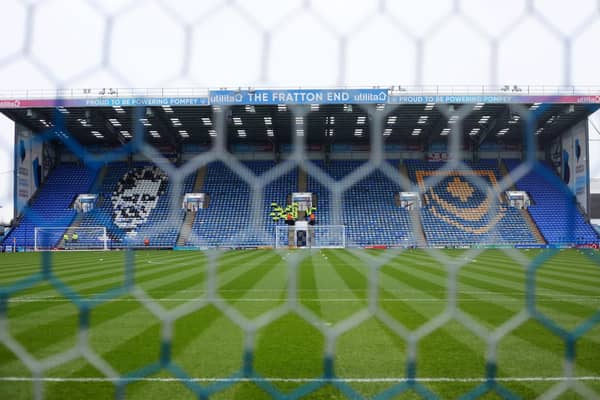 Mosaics depicting Jimmy Dickinson and the Pompey crest have overlooked the Fratton Park pitch since 1997.