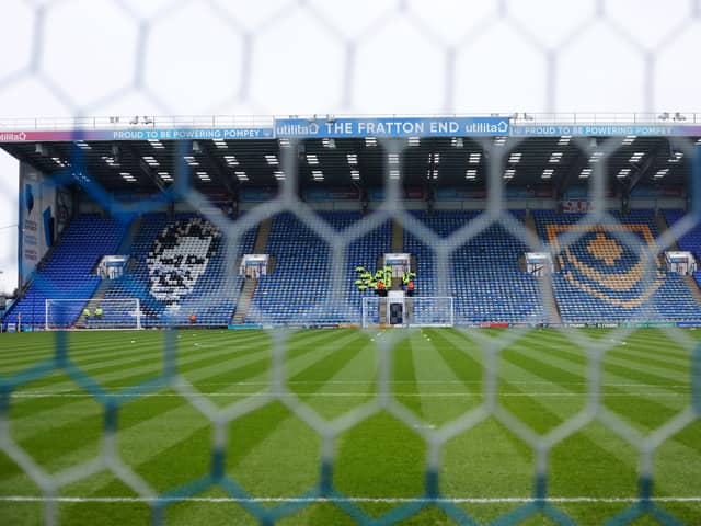 Mosaics depicting Jimmy Dickinson and the Pompey crest have overlooked the Fratton Park pitch since 1997.