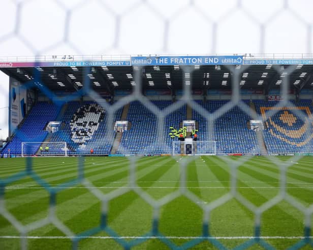 Mosaics depicting Jimmy Dickinson and the Pompey crest have overlooked the Fratton Park pitch since 1997.