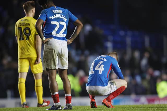Andy Cannon dejected after Pompey's 2-2 draw with Fleetwood in March - the final game before the lockdown period. Picture: Joe Pepler