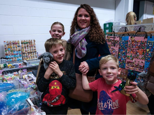 Hayley Wilson and her children enjoy the HTC Christmas Fayre 2024. Picture: Chris Moorhouse (161124-57)