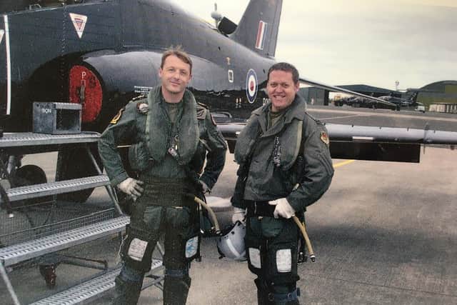 L to R: Tim and Paul after flying the Hawk together in 2005. Picture: Royal Navy..