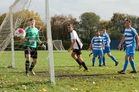 Lakeside score their consolation goal in a Portsmouth & District FA Trophy loss to AC Copnor. Picture by Kevin Shipp.