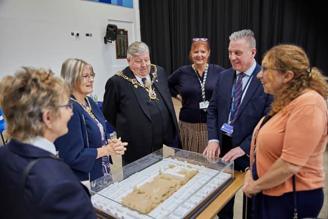 Cllr Suzy Horton, Headteacher David Jeapes, Lord Mayor Councillor Frank Jonas, Lady Mayoress Maddox around a model of the new school building.