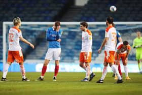 Tom Naylor dejected after Pompey's defeat to Blackpool. Picture: Joe Pepler