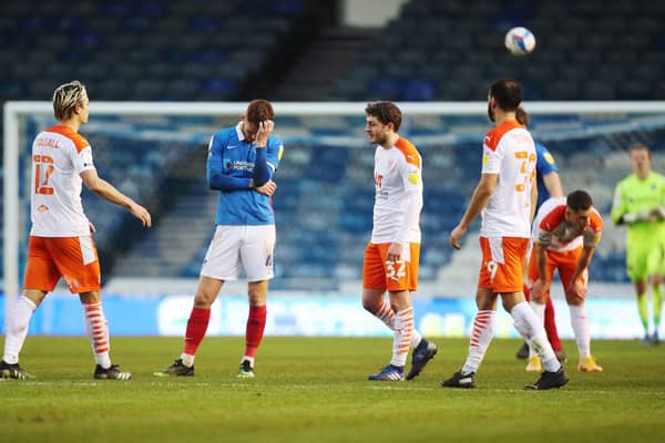 Tom Naylor dejected after Pompey's defeat to Blackpool. Picture: Joe Pepler