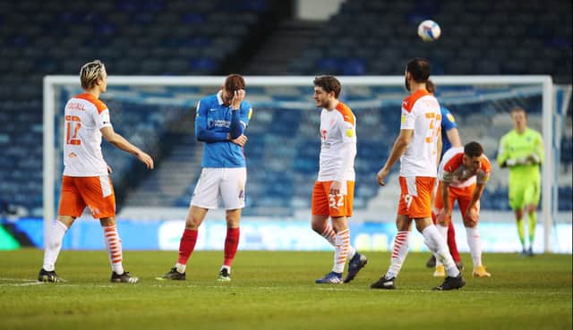 Tom Naylor dejected after Pompey's defeat to Blackpool. Picture: Joe Pepler