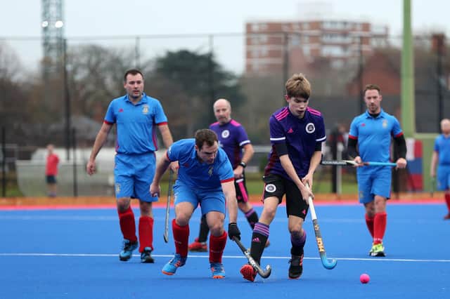 Caleb Rowland (purple) in action against US Portsmouth 2nds. Picture: Chris Moorhouse