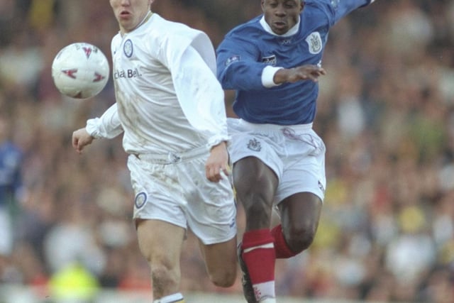 Leeds' Gunner Halle is challenged by Paul Hall at Elland Road as Pompey claim a 3-2 win in the FA Cup Fifth Round in February 1997. Picture: Anton Want/Allsport